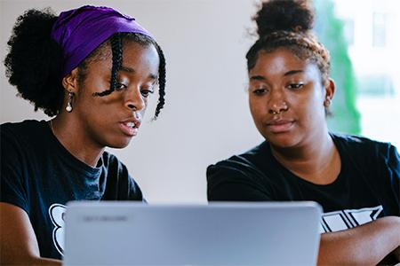 two students discussing the UB transfer application